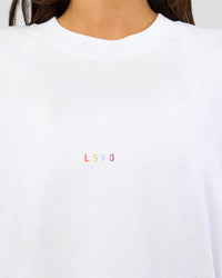 Woman wearing Pride Sticker Boxy Tee - White | Model:Bianca | Size:XS