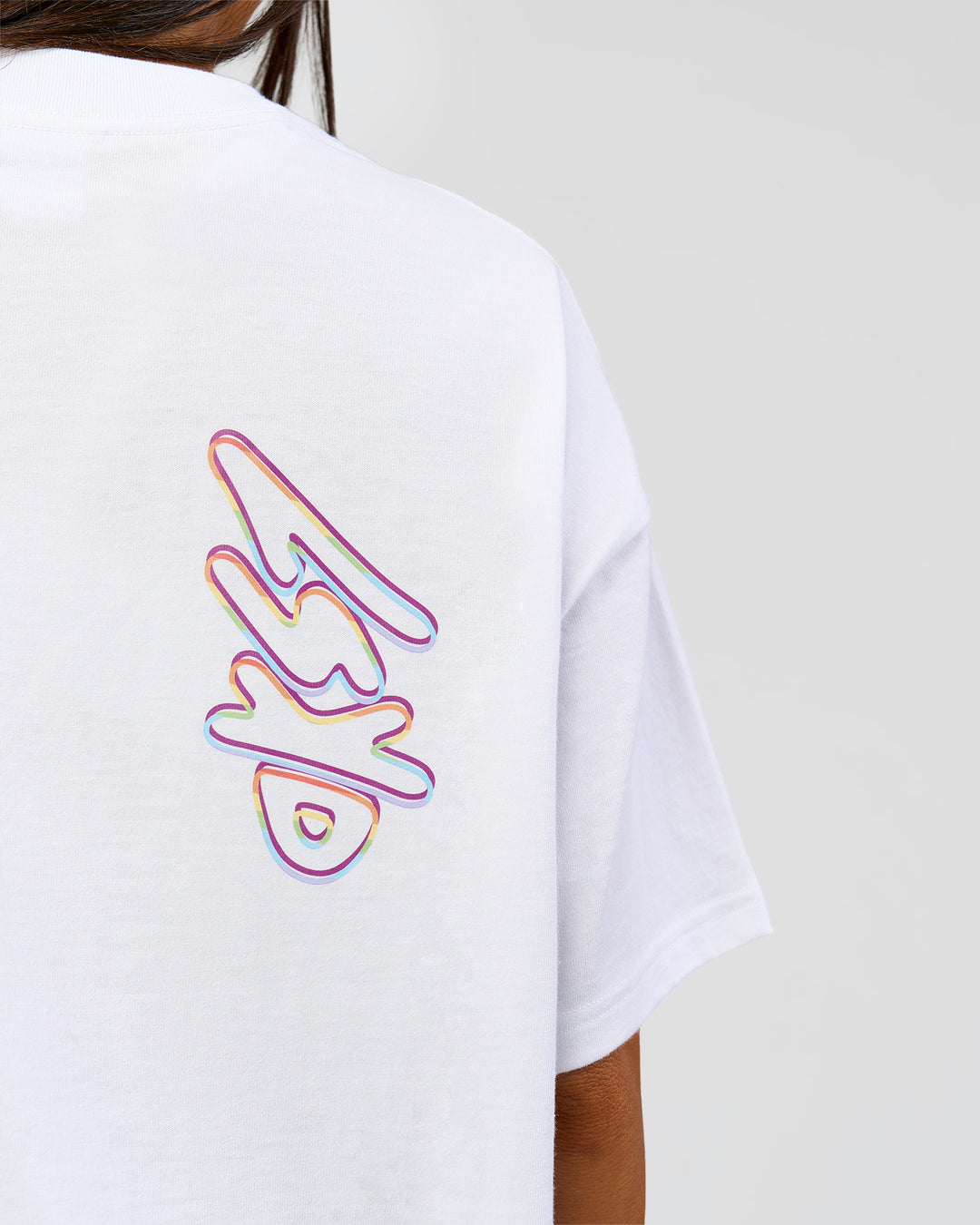 Woman wearing Pride Sticker Boxy Tee - White | Model:Bianca | Size:XS