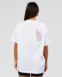 Woman wearing Pride Sticker Boxy Tee - White | Model:Bianca | Size:XS