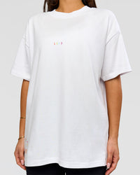 Woman wearing Pride Sticker Boxy Tee - White | Model:Bianca | Size:XS