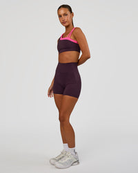 Woman wearing Progression Ultra High-Rise 4" Short - Midnight Plum | Model:Brylee | Size:XS | Thumbnail Index: 7
