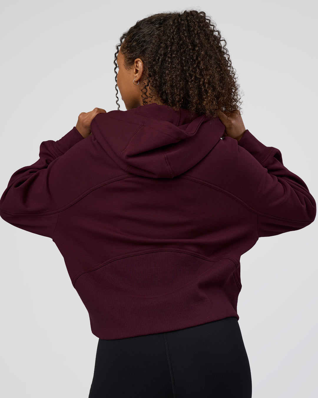 Woman wearing Pursue Mid-Weight Hoodie - Cherry Lacquer | Model:Jordan | Size:XS