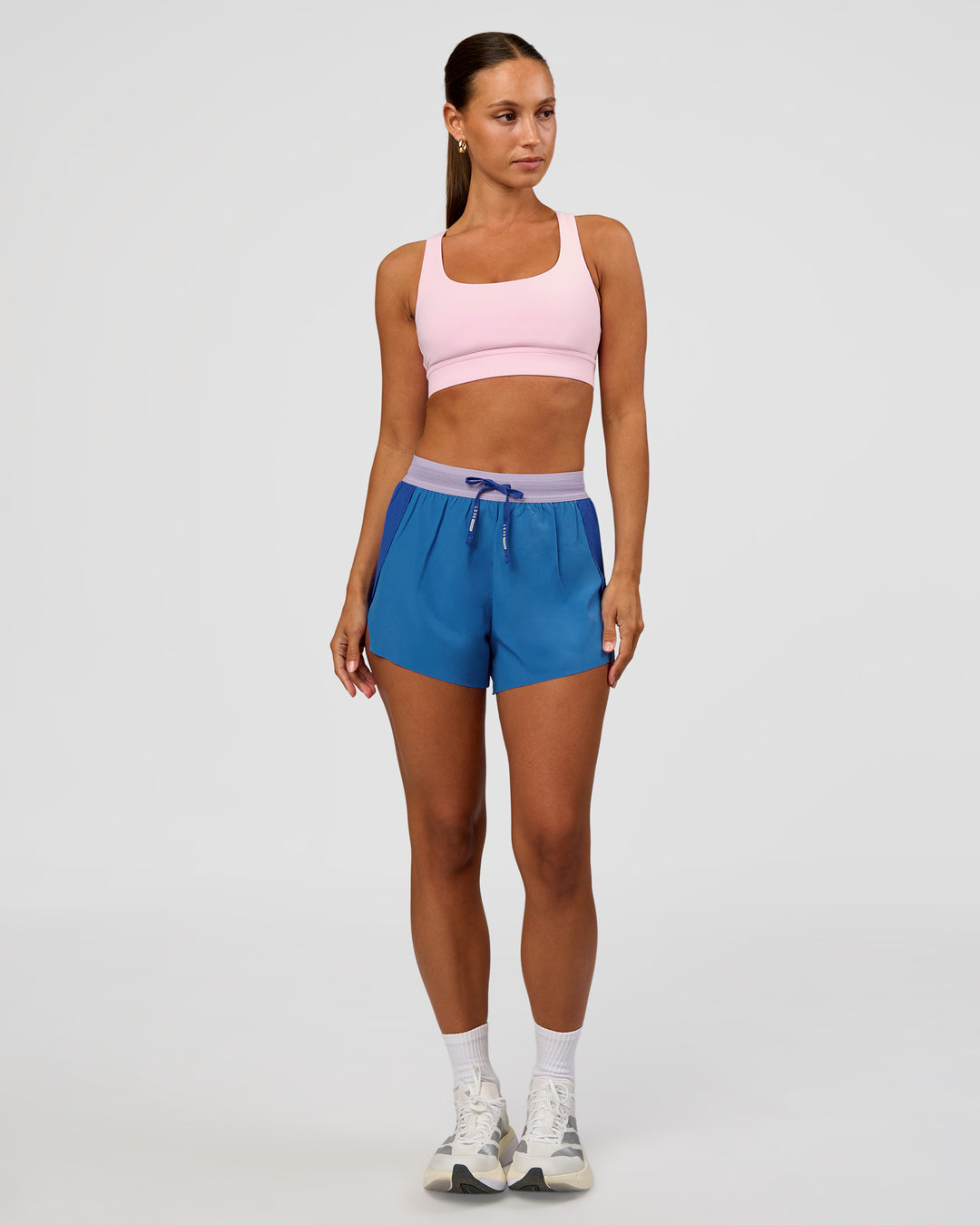 Woman wearing Race Day Sports Bra - Marshmallow | Model:Brylee | Size:XS - view 3