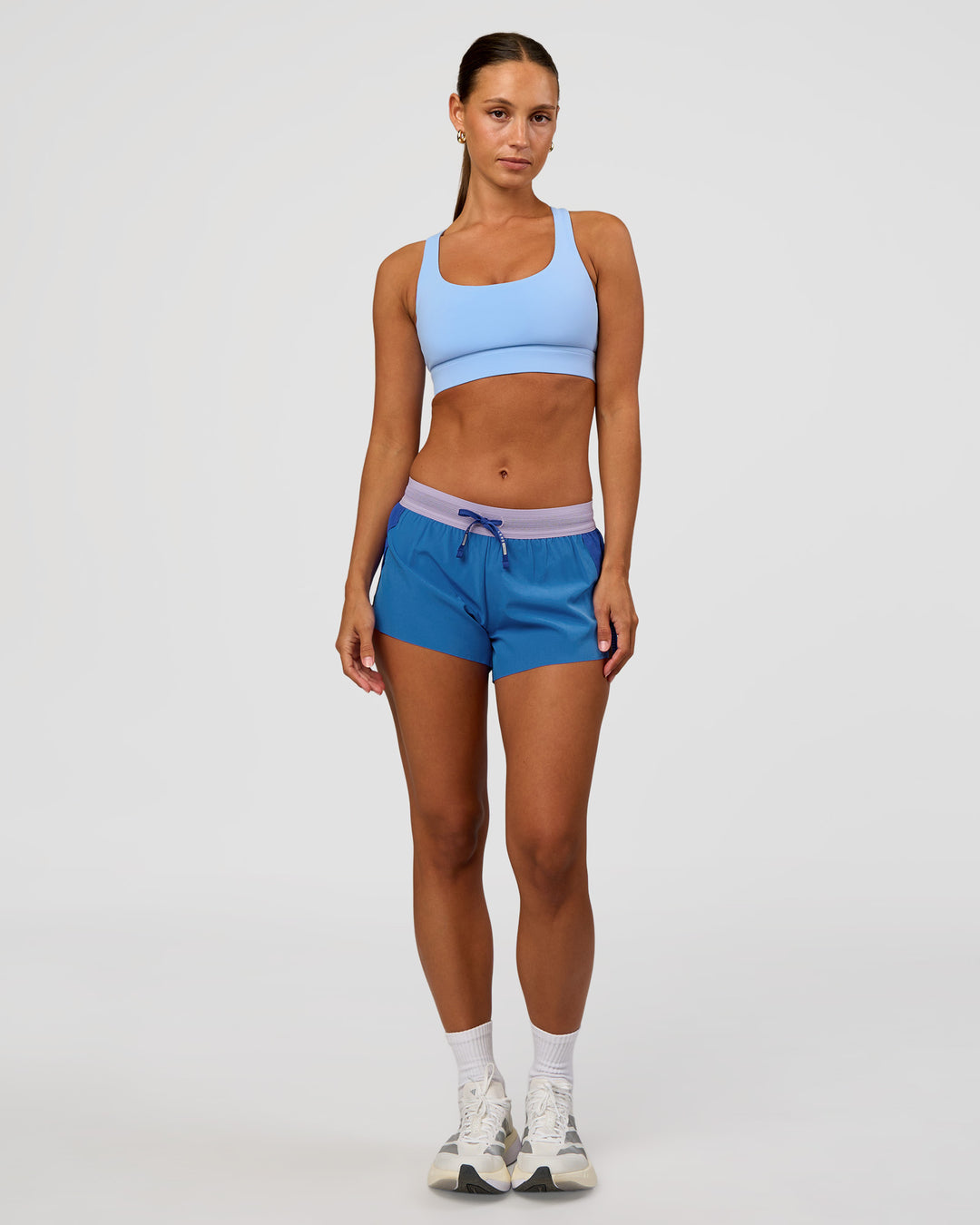 Woman wearing Race Day Sports Bra - Open Air | Model:Brylee | Size:XS