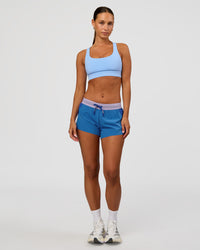 Woman wearing Race Day Sports Bra - Open Air | Model:Brylee | Size:XS