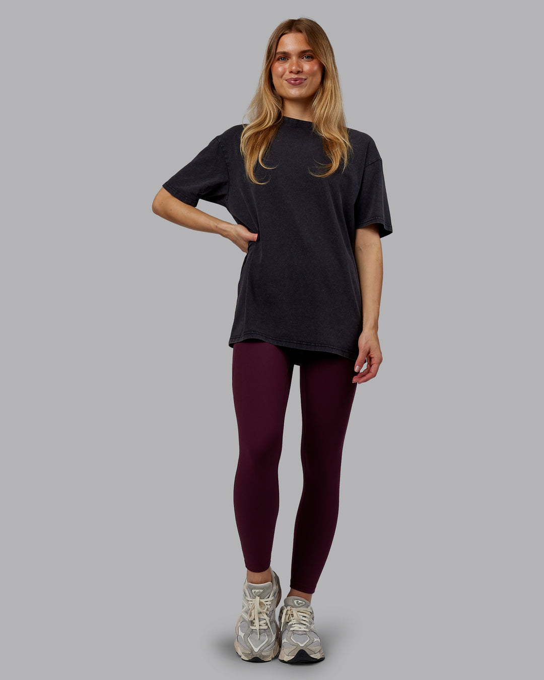Woman wearing Rise &amp; Lift Washed FLXCotton Oversized Tee - Black-Plum Berry | Model:Emilie | Size:XS