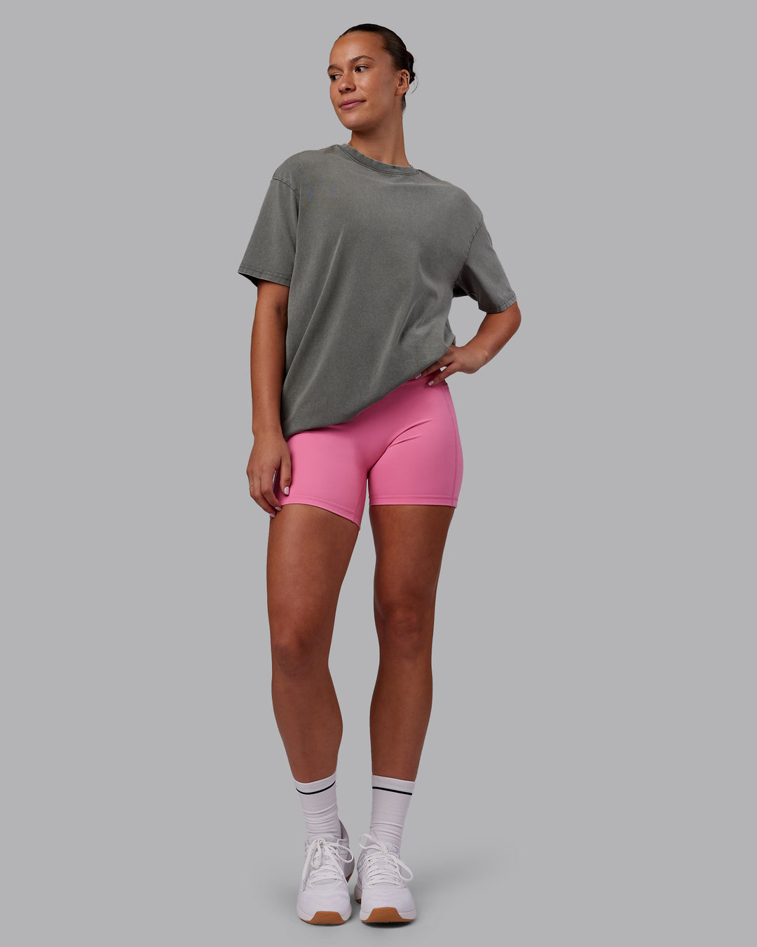 Woman wearing Rise &amp; Lift Washed FLXCotton Oversized Tee - Graphite-Purple Opulence | Model:Charlize | Size:XS