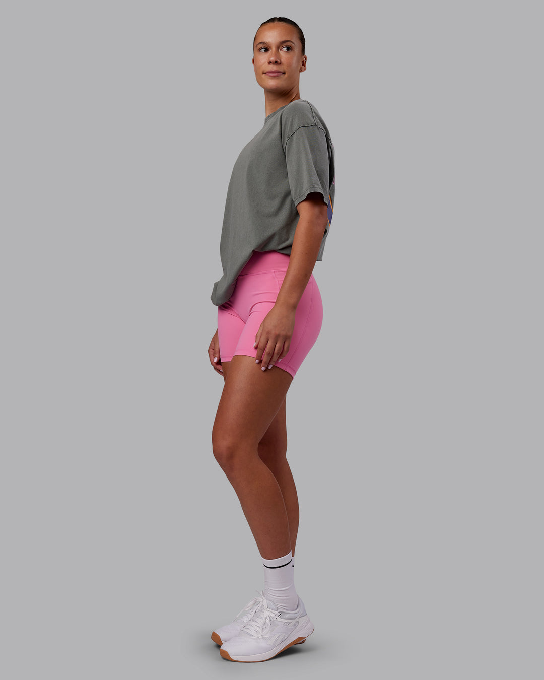 Woman wearing Rise &amp; Lift Washed FLXCotton Oversized Tee - Graphite-Purple Opulence | Model:Charlize | Size:XS