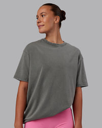 Woman wearing Rise & Lift Washed FLXCotton Oversized Tee - Graphite-Purple Opulence | Model:Charlize | Size:XS
