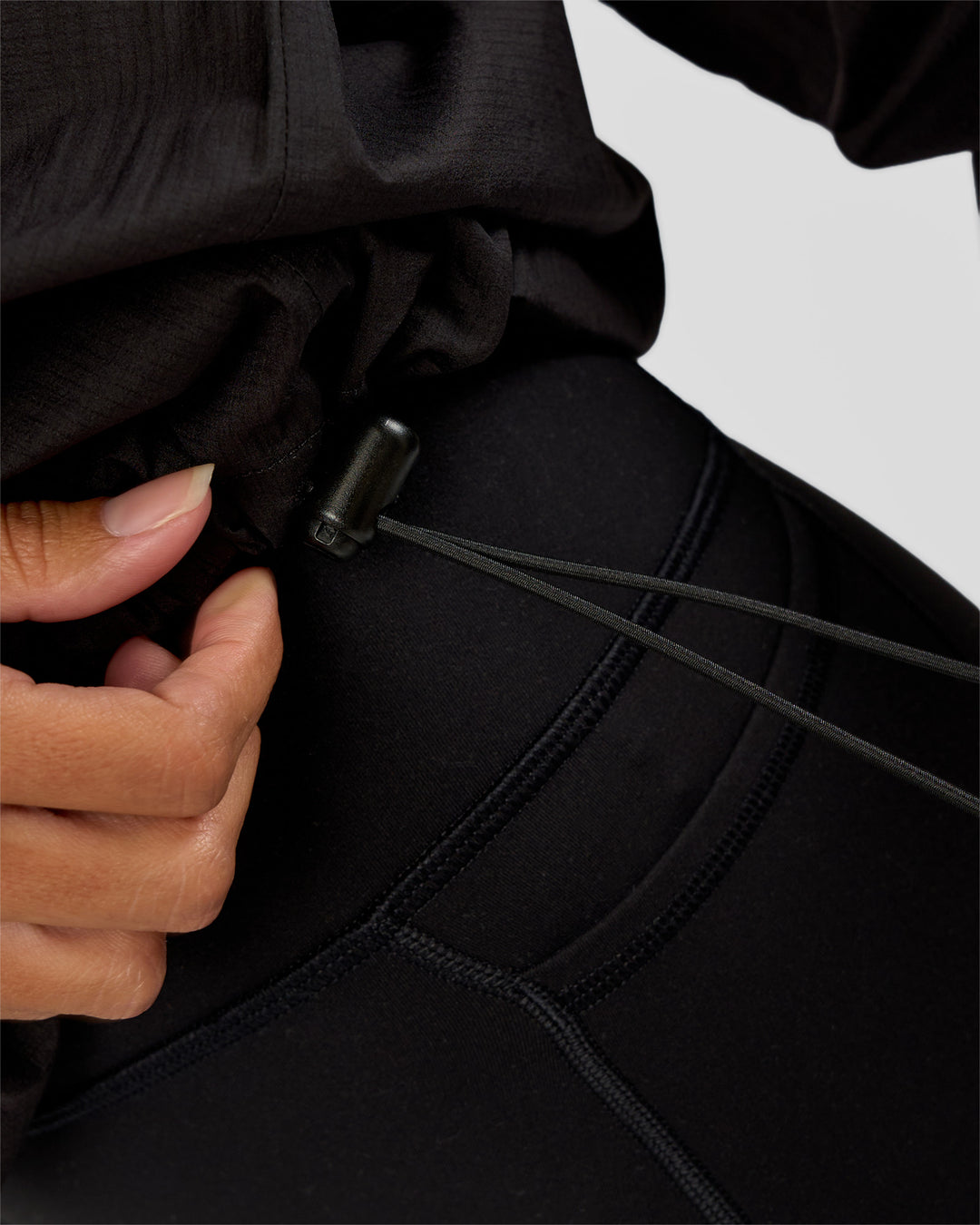 Woman wearing Run Light Jacket - Black | Model:Brylee | Size:XS