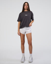 Woman wearing Runner's FLXCotton Oversized Tee - Black Washed-White | Model:Estella | Size:XS
