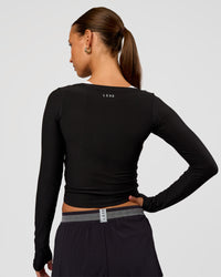 Woman wearing Scrunch Long Sleeve Tee - Black | Model:Brylee | Size:XS