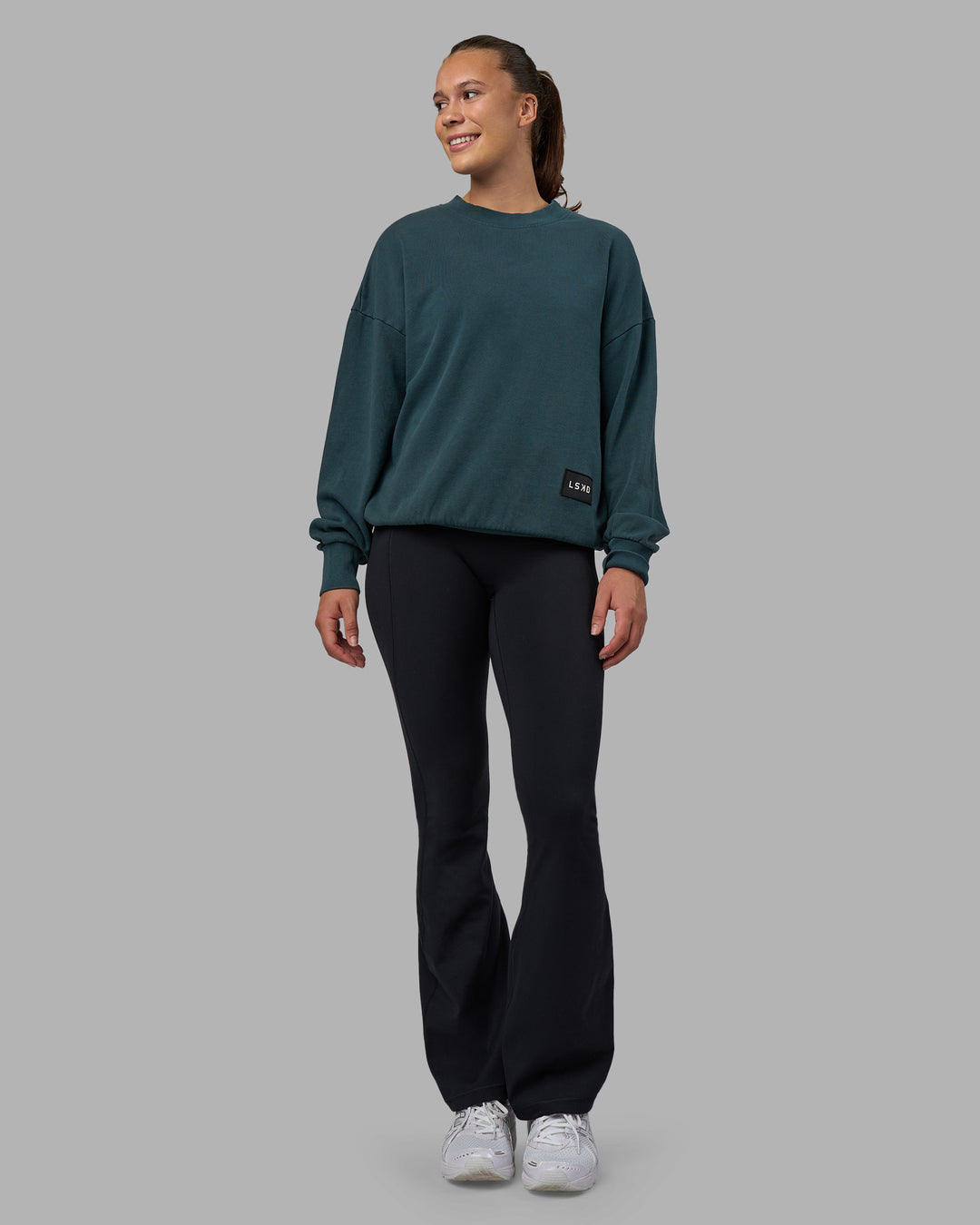 Woman wearing Segmented Oversized Sweater - Abyssal | Model:Charlize | Size:XS