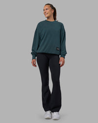 Woman wearing Segmented Oversized Sweater - Abyssal | Model:Charlize | Size:XS