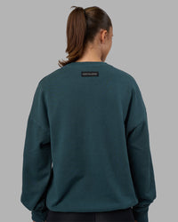 Woman wearing Segmented Oversized Sweater - Abyssal | Model:Charlize | Size:XS
