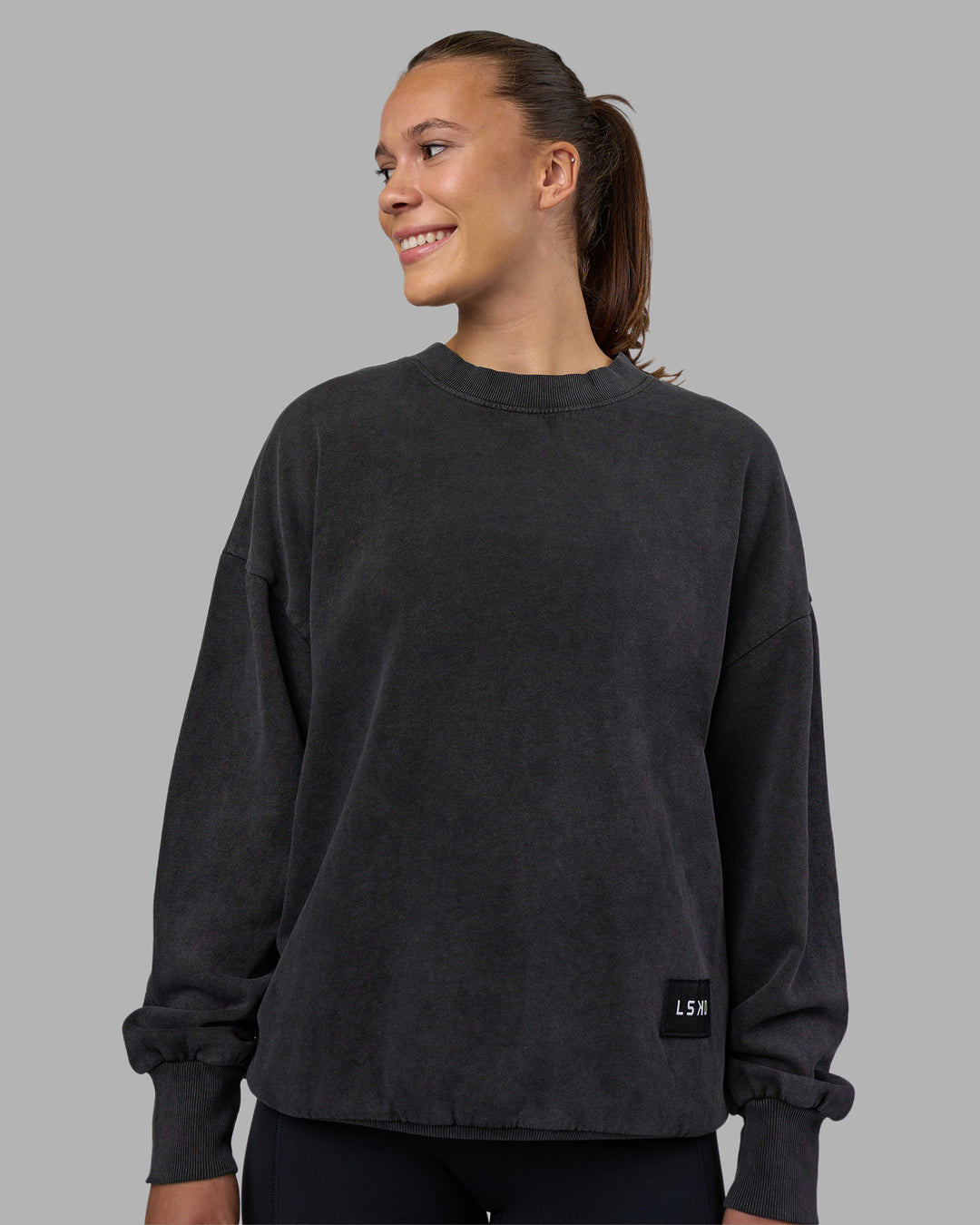 Woman wearing Segmented Oversized Sweater - Black Washed | Model:Charlize | Size:XS