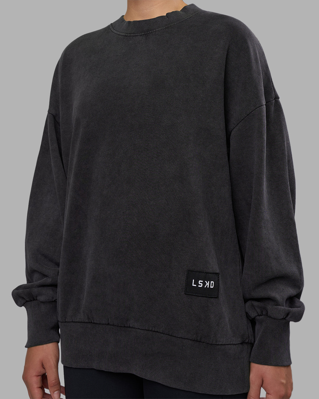 Woman wearing Segmented Oversized Sweater - Black Washed | Model:Charlize | Size:XS
