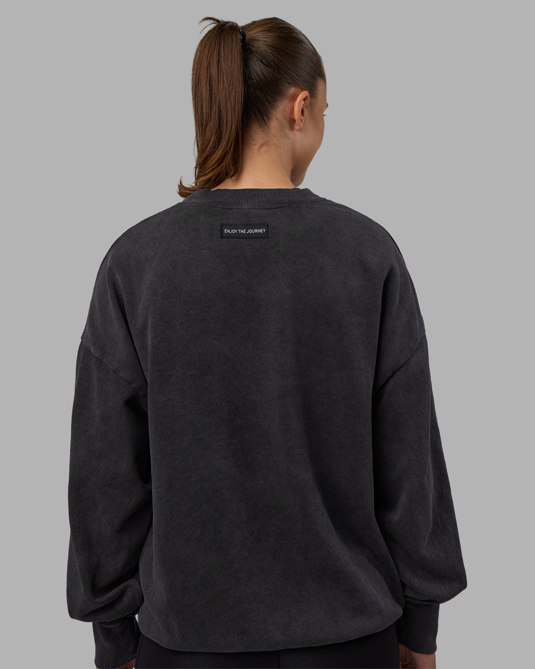 Woman wearing Segmented Oversized Sweater - Black Washed | Model:Charlize | Size:XS