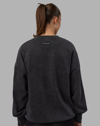 Woman wearing Segmented Oversized Sweater - Black Washed | Model:Charlize | Size:XS
