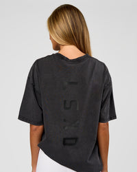 Woman wearing Shadow Mode FLXCotton Oversized Tee - Black Washed | Model:Georgia | Size:XS