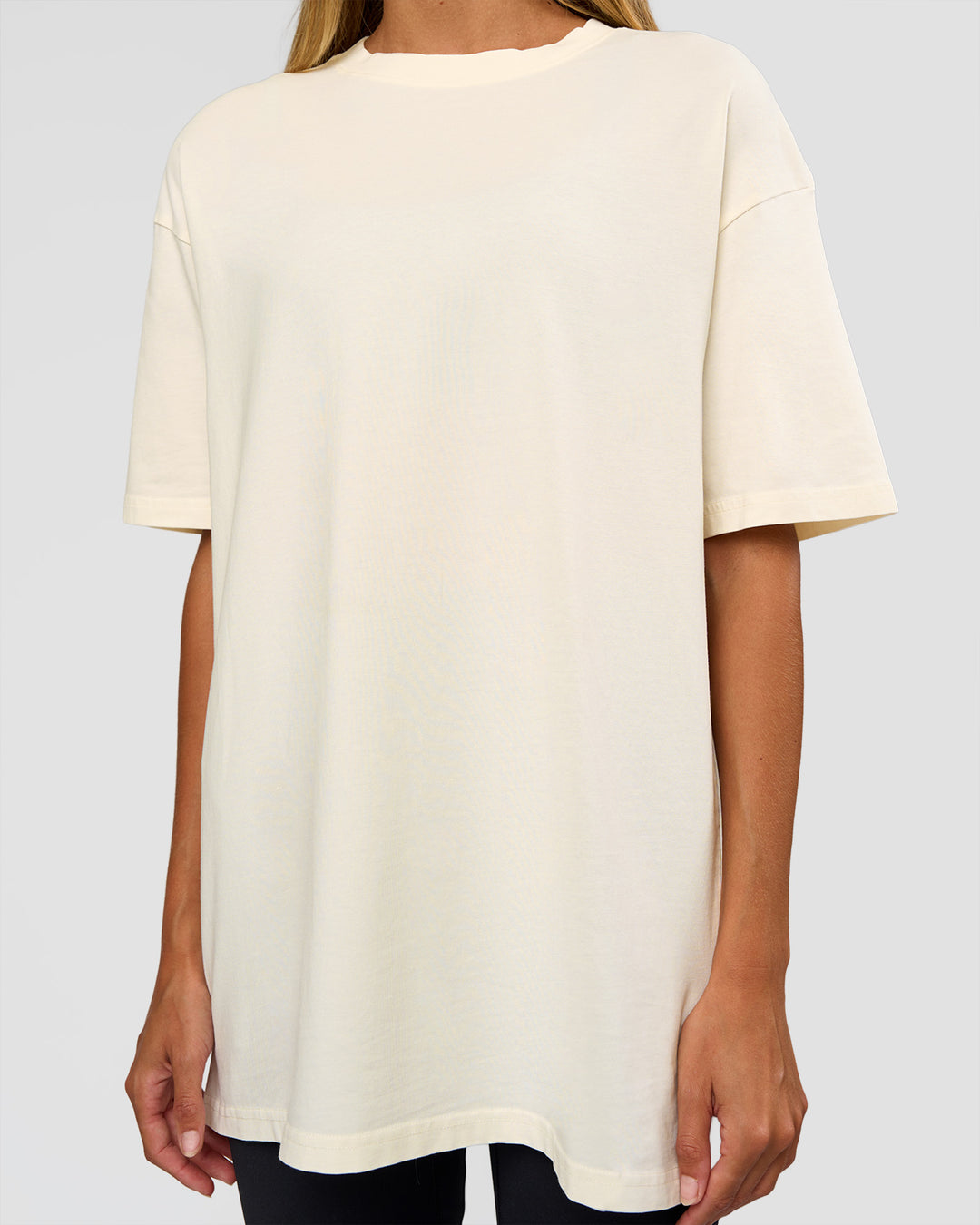 Woman wearing Shadow Mode FLXCotton Oversized Tee - Off White Washed | Model:Georgia | Size:XS