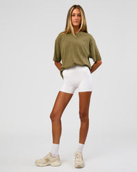 Woman wearing Shadow Mode FLXCotton Oversized Tee - Walnut Grey Washed | Model:Georgia | Size:XS