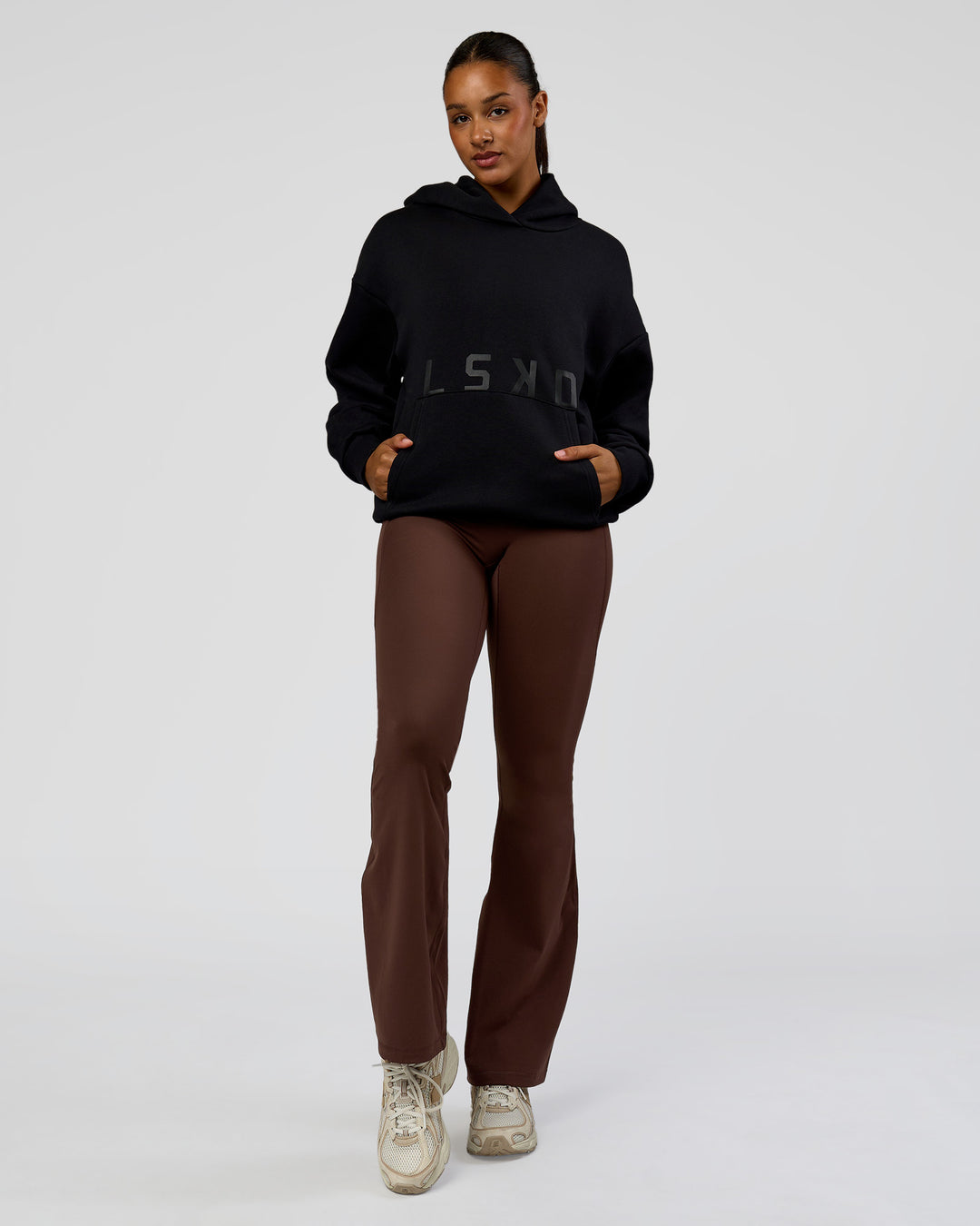 Woman wearing Shadow Mode Oversized Hoodie - Black | Model:Rosie | Size:XS