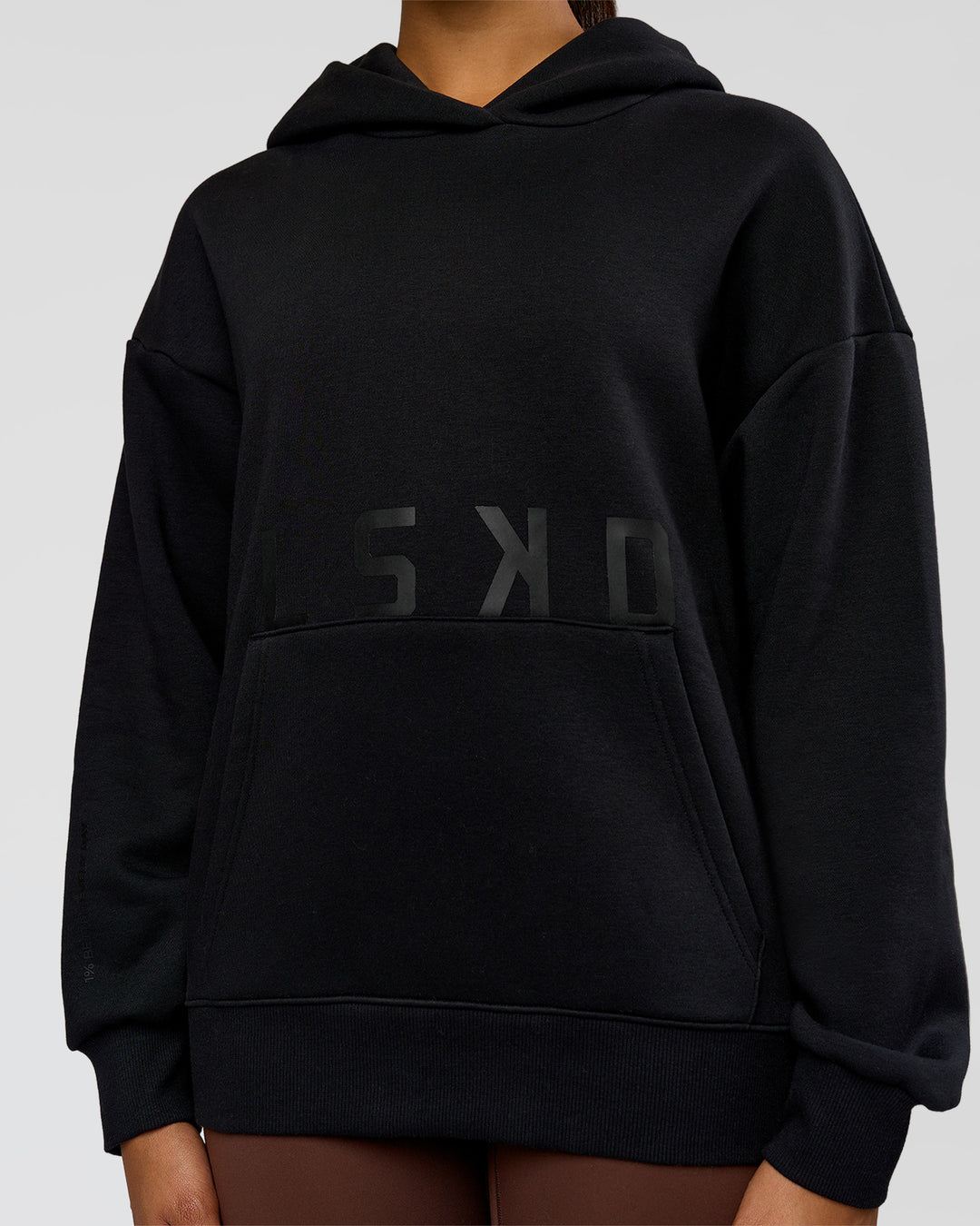 Woman wearing Shadow Mode Oversized Hoodie - Black | Model:Rosie | Size:XS