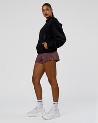 Woman wearing Shadow Mode Oversized Hoodie - Black | Model:Rosie | Size:XS