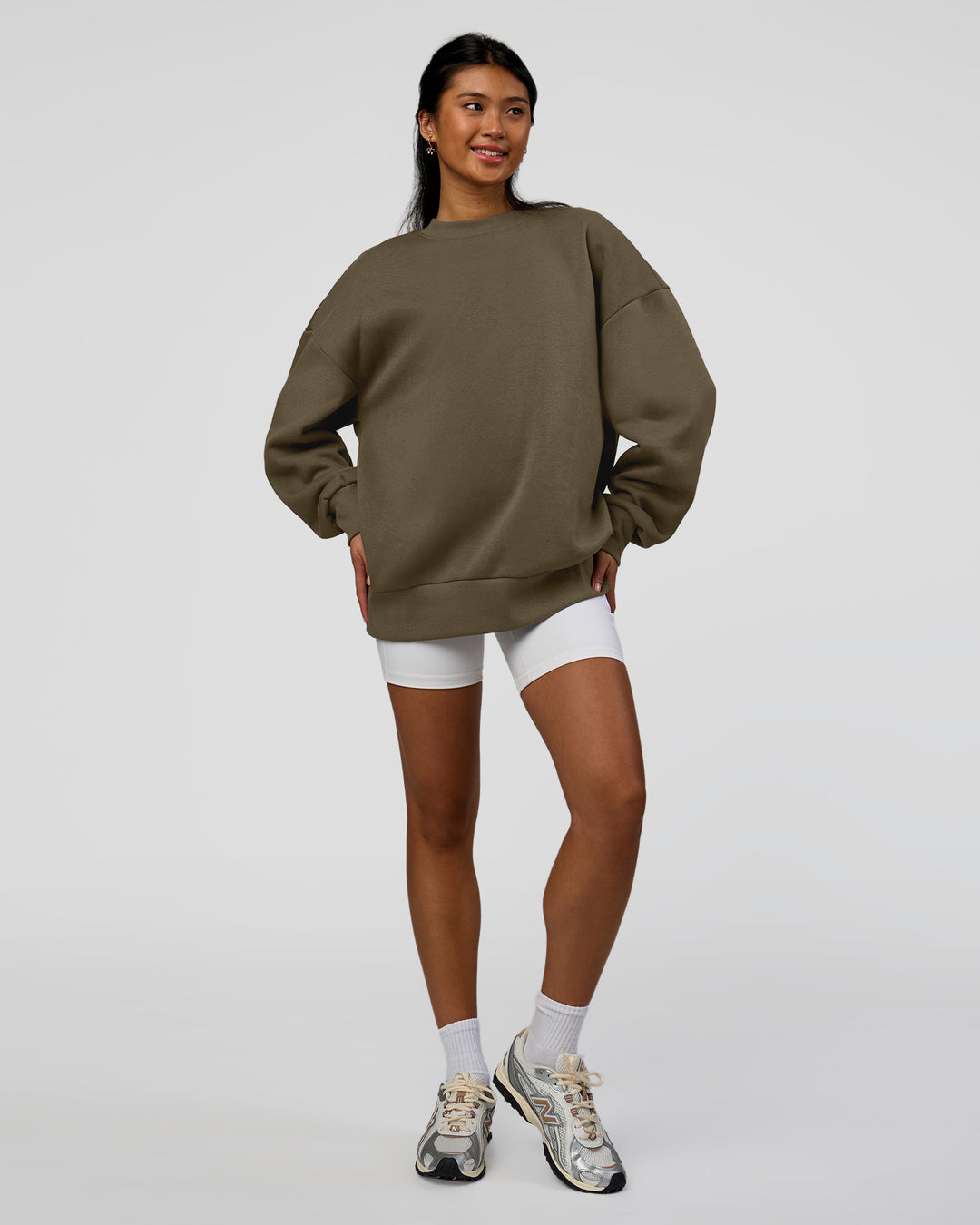Woman wearing Shadow Mode Oversized Sweater - Walnut Grey | Model:Alex | Size:XS
