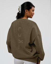Woman wearing Shadow Mode Oversized Sweater - Walnut Grey | Model:Alex | Size:XS