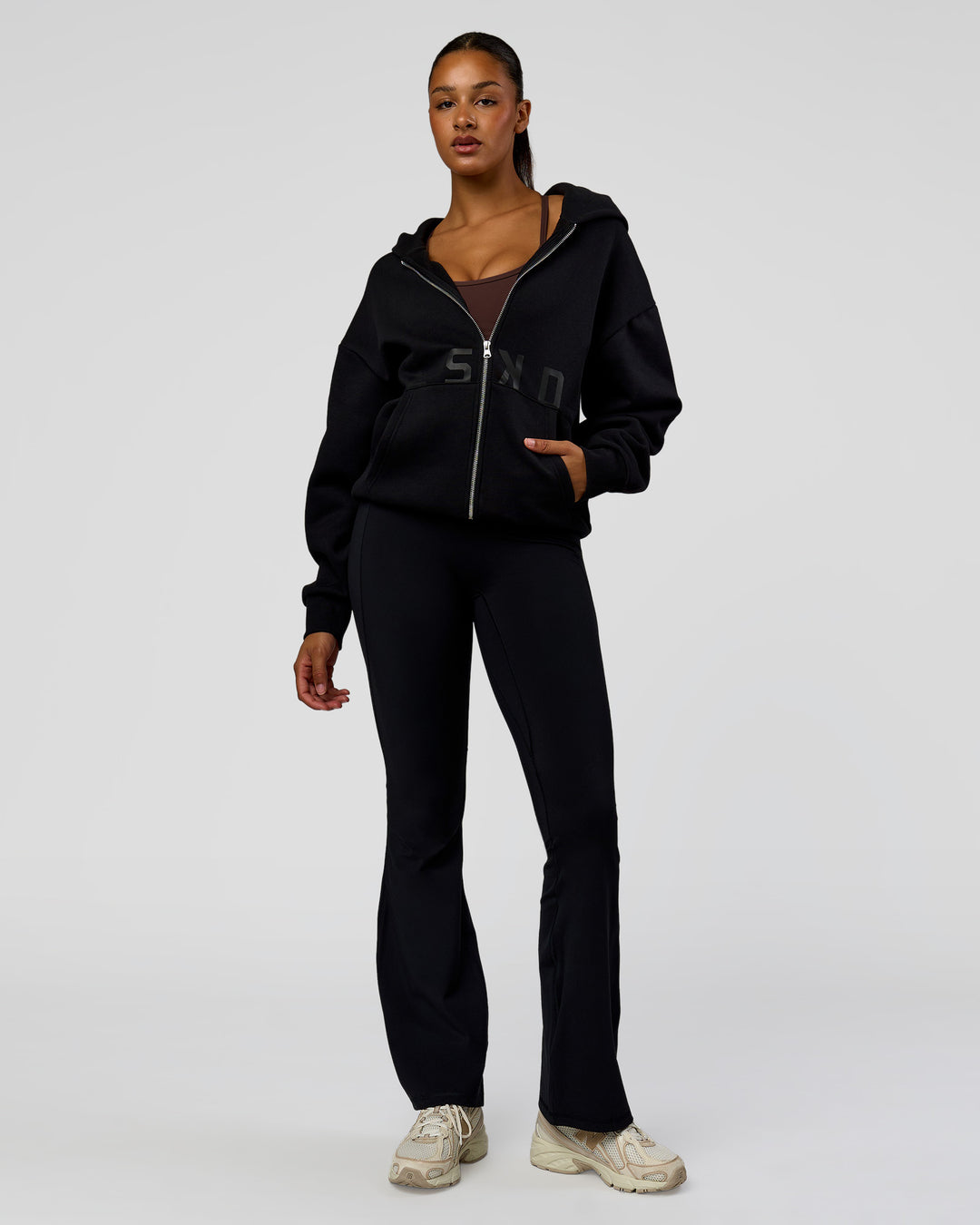 Woman wearing Shadow Mode Oversized Zip Through Hoodie - Black | Model:Rosie | Size:XS