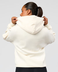 Woman wearing Shadow Mode Oversized Zip Through Hoodie - Off White | Model:Rosie | Size:XS