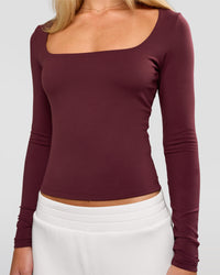 Woman wearing Show It Off Long Sleeve Top in Cherry Lacquer | Model:Issy | Size:XS
