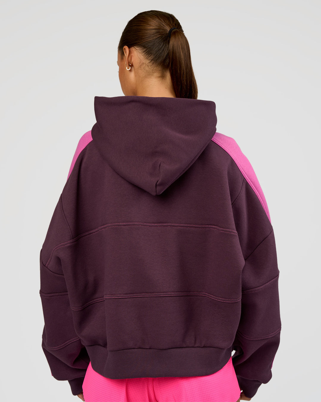 Woman wearing Slam Cropped Oversized Hoodie - Midnight Plum-Ultra Fuchsia | Model:Brylee | Size:XS