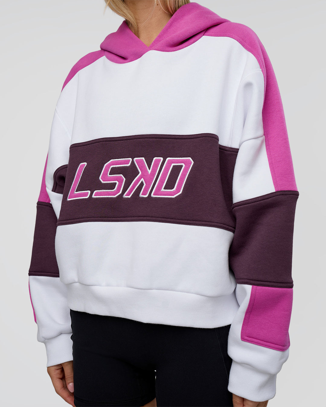 Woman wearing Slam Cropped Oversized Hoodie - White-Ultra Fuchsia | Model:Leilani | Size:XS