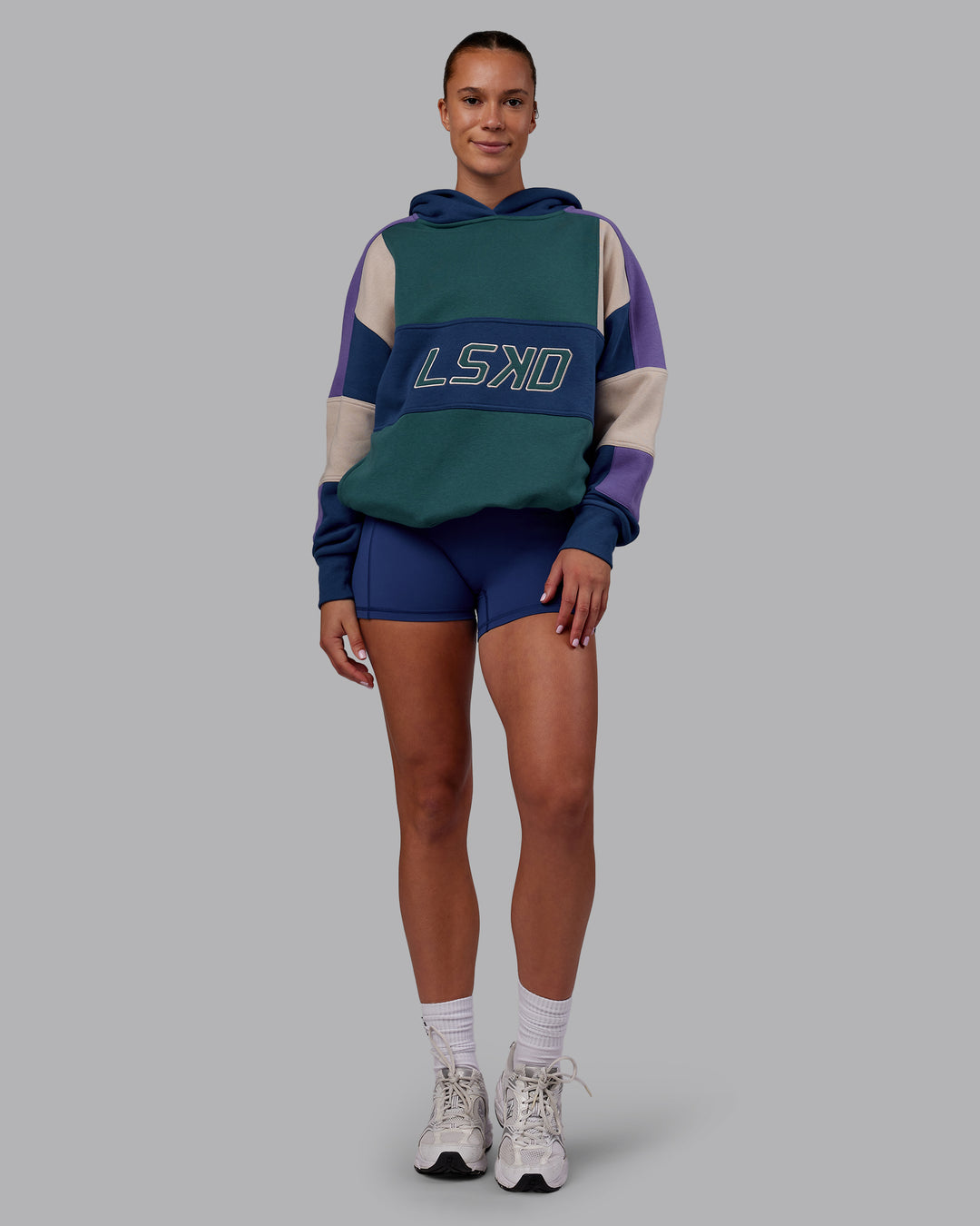 Woman wearing Slam Oversized Hoodie - Atlantic-Multi | Model:Charlize | Size:XS