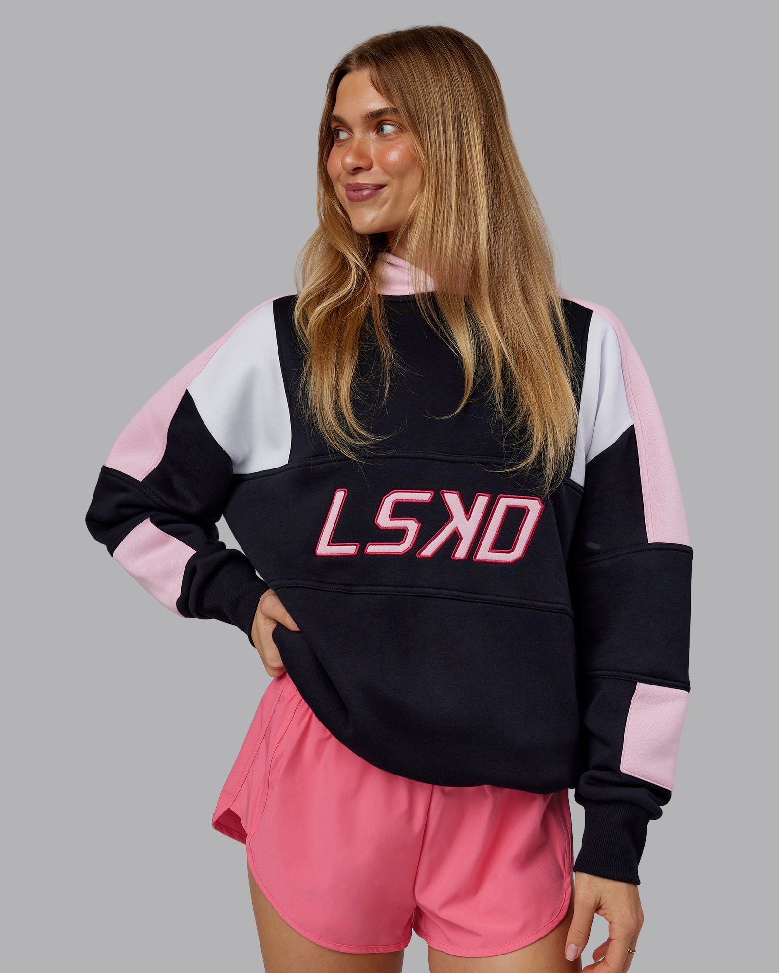 Woman wearing Slam Oversized Hoodie - Caviar-Light Bubblegum | Model:Emilie | Size:XS