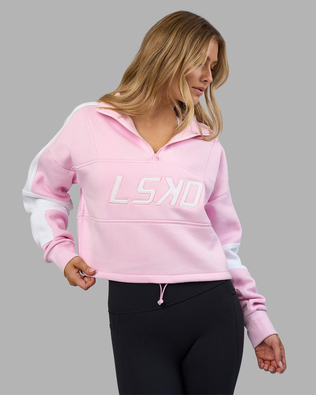 Woman wearing Slam Quarter Zip Sweater - Marshmallow-White | Model:Leilani | Size:XS