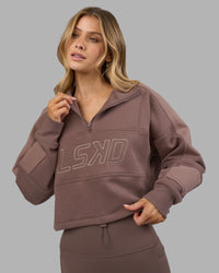 Woman wearing Slam Quarter Zip Sweater - Peppercorn | Model:Leilani | Size:XS