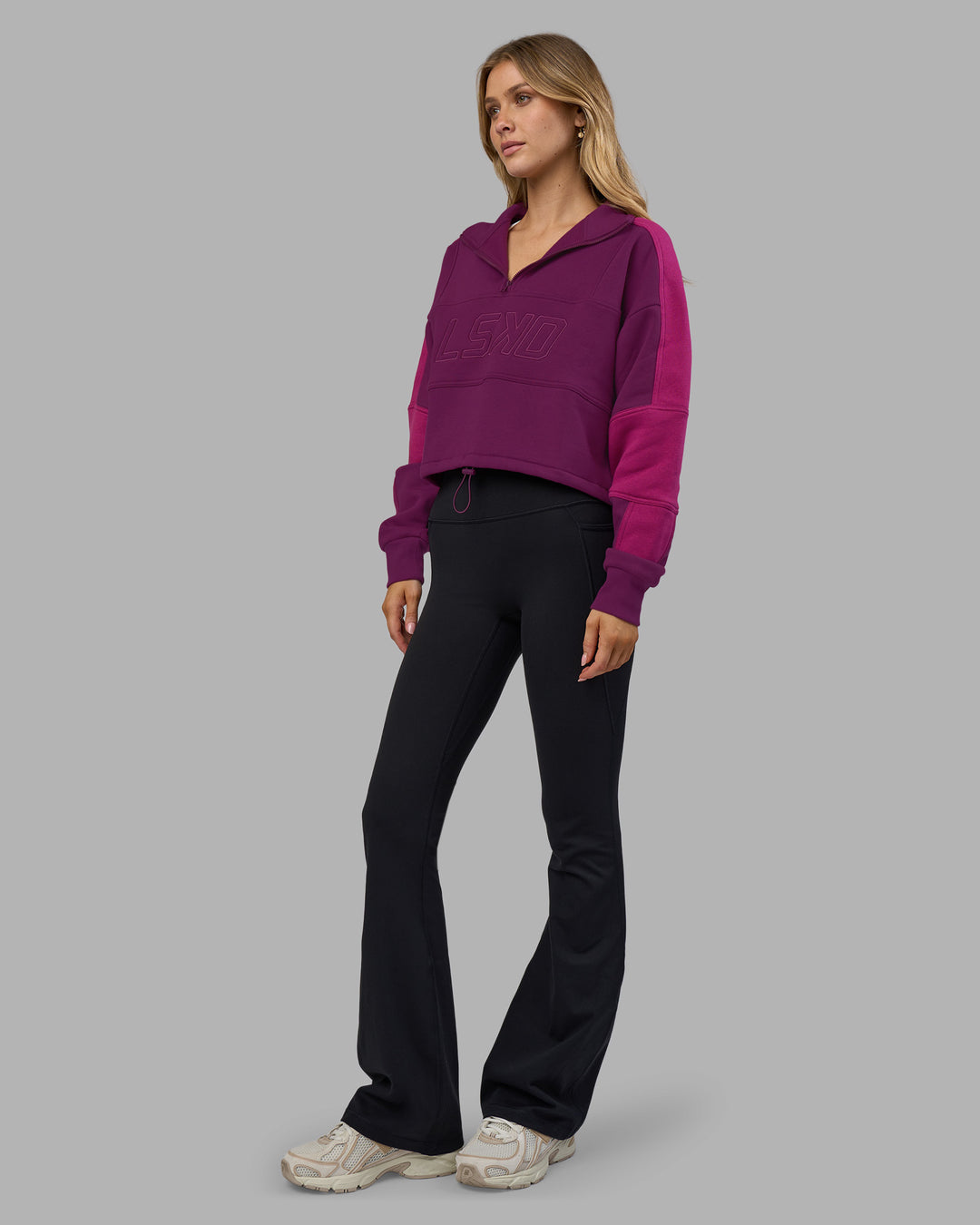 Woman wearing Slam Quarter Zip Sweater - Plum Caspia-Boysenberry | Model:Leilani | Size:XS