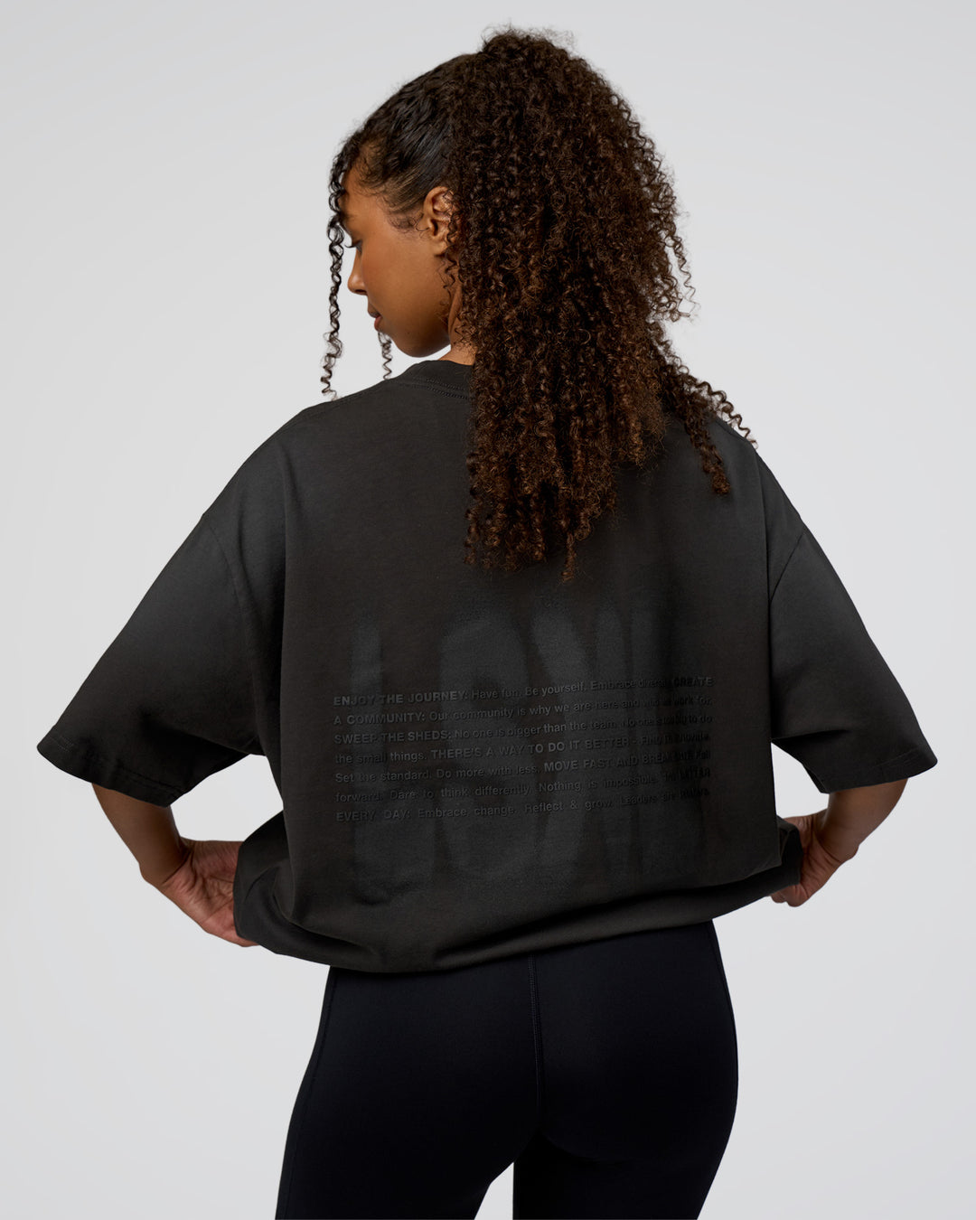 Woman wearing Spray Heavyweight Unisex Oversized Tee - Charcoal Washed | Model:Jordan | Size:S
