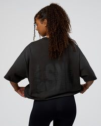 Woman wearing Spray Heavyweight Unisex Oversized Tee - Charcoal Washed | Model:Jordan | Size:S