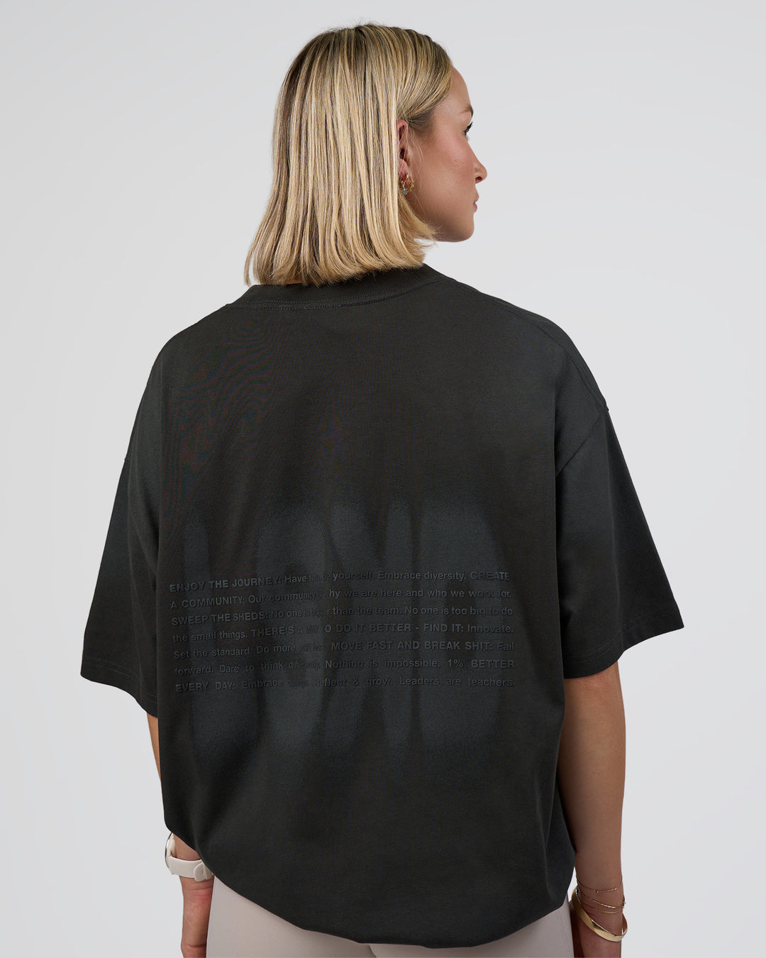 Woman wearing Spray Heavyweight Unisex Oversized Tee - Charcoal Washed | Model:Halle | Size:XS