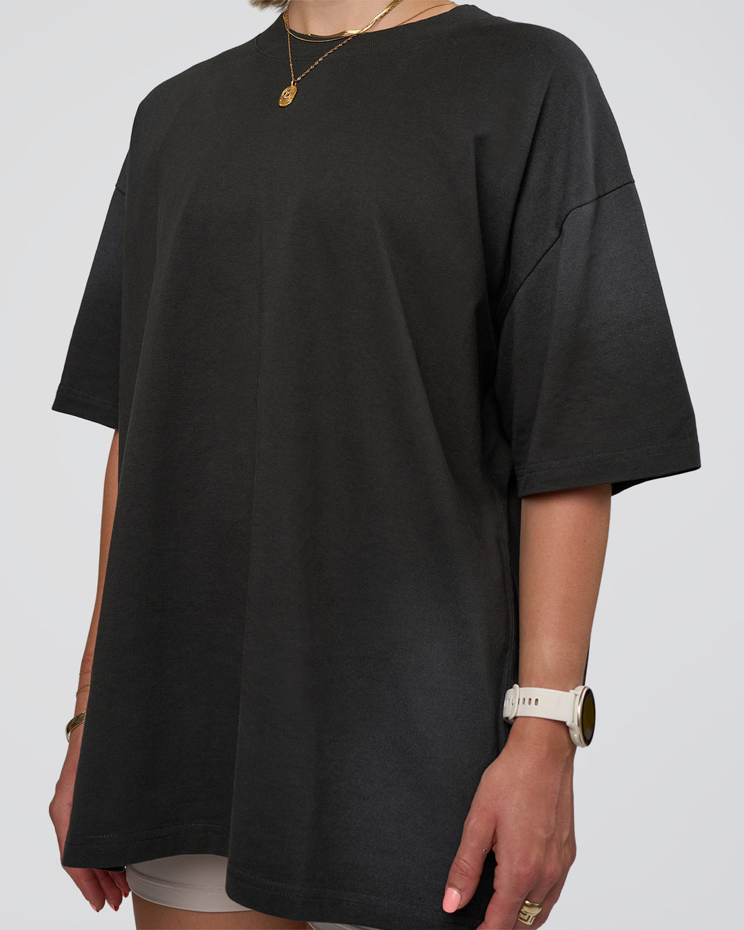 Woman wearing Spray Heavyweight Unisex Oversized Tee - Charcoal Washed | Model:Halle | Size:XS