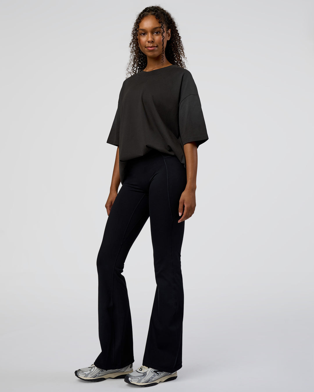 Woman wearing Spray Heavyweight Unisex Oversized Tee - Charcoal Washed | Model:Jordan | Size:S