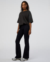 Woman wearing Spray Heavyweight Unisex Oversized Tee - Charcoal Washed | Model:Jordan | Size:S