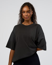 Woman wearing Spray Heavyweight Unisex Oversized Tee - Charcoal Washed | Model:Jordan | Size:S