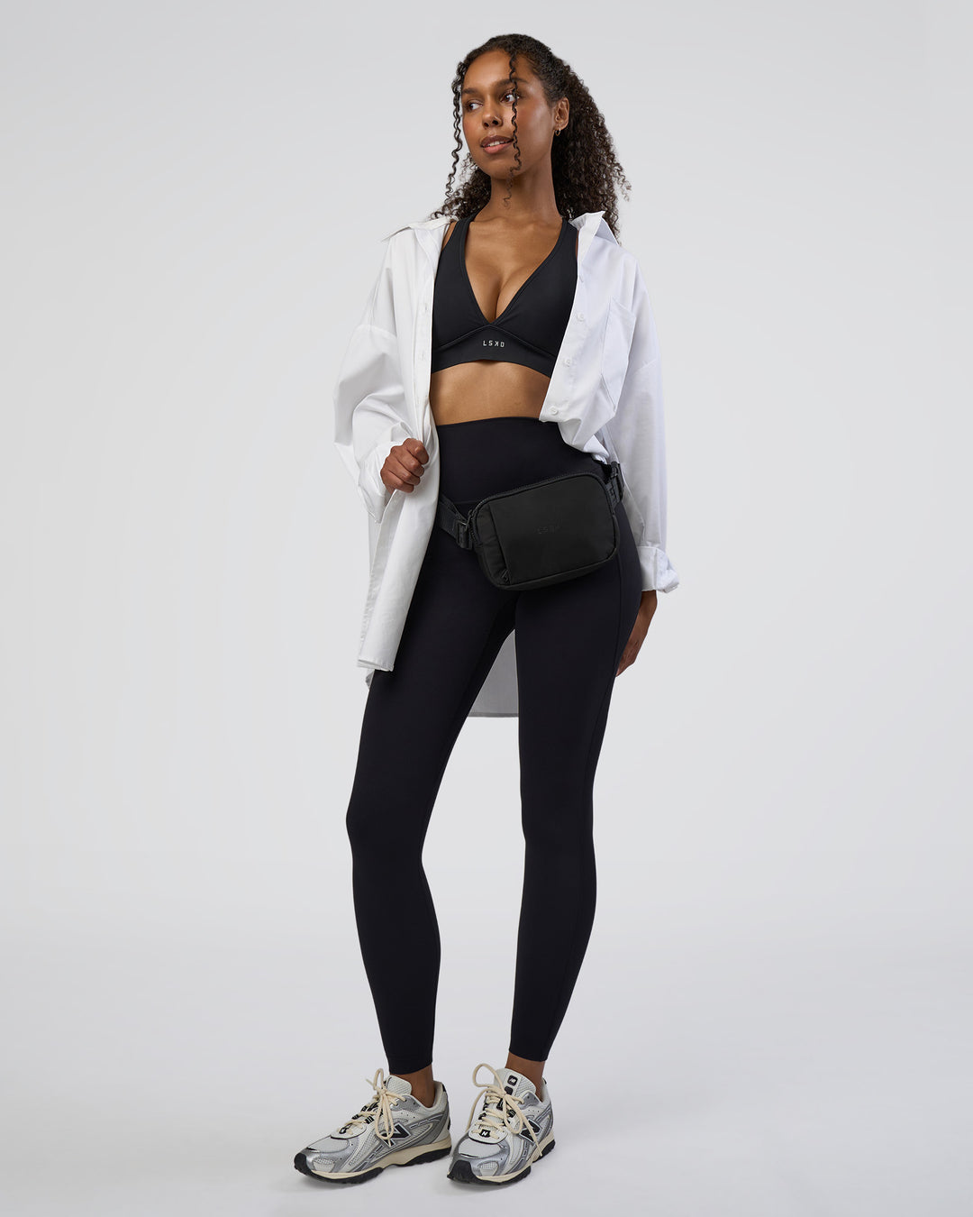 Woman wearing Stamina Sports Bra D/DD/E - Black | Model:Jordan | Size:XS