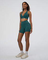 Woman wearing Stamina Sports Bra D/DD/E - Transformative Teal | Model:Jordan | Size:XS